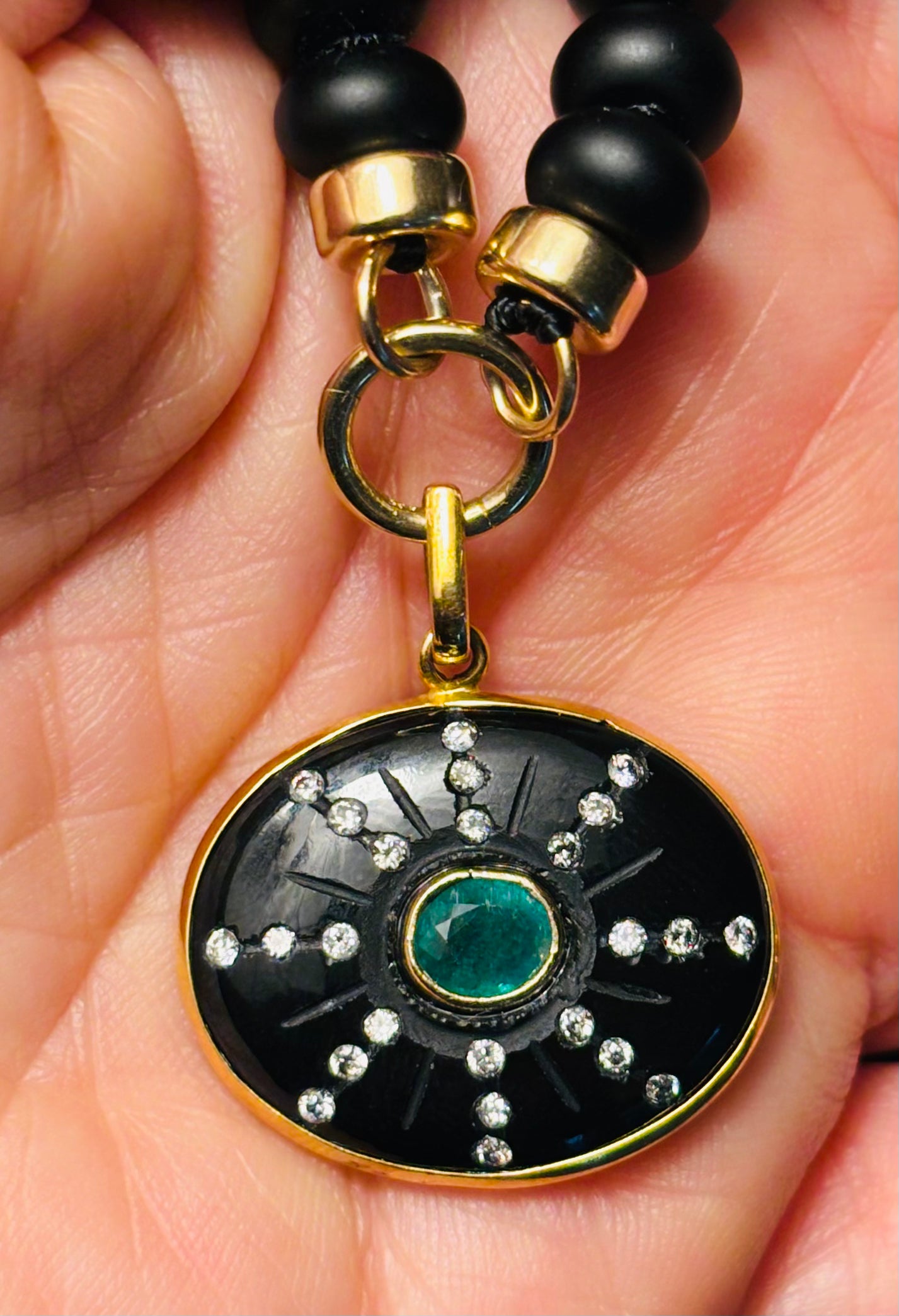 S O L Pendant, black onyx, emerald, diamonds